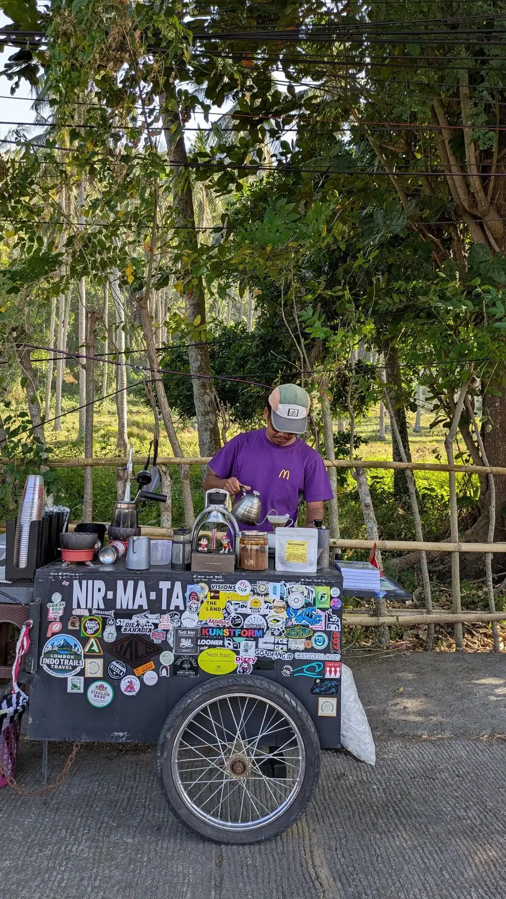 The NIR-MA-TA cart covered in stickers left by travellers