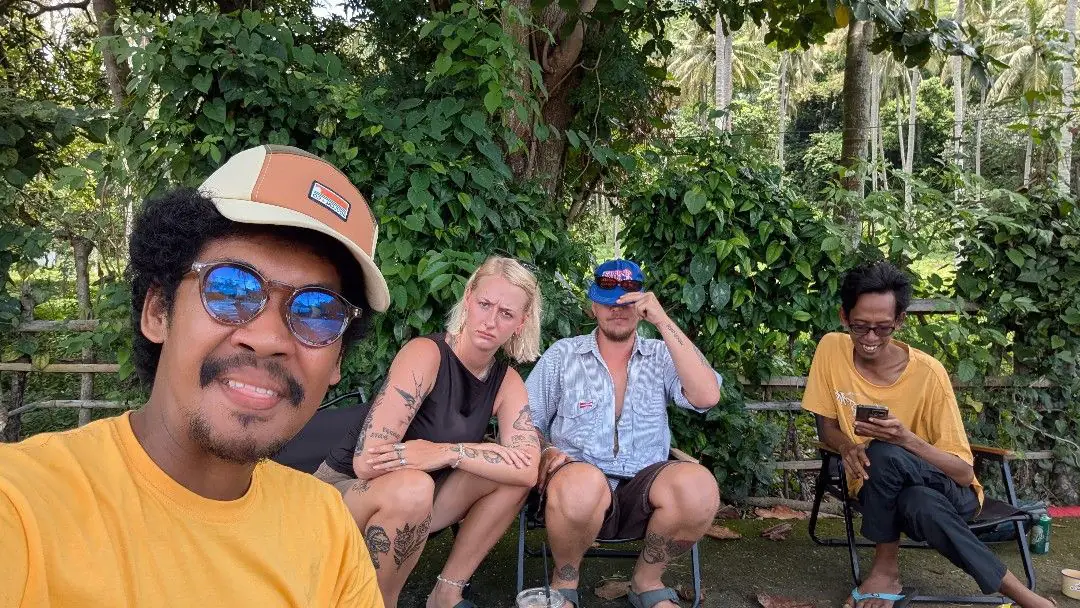 Juandi and friends sitting out the back