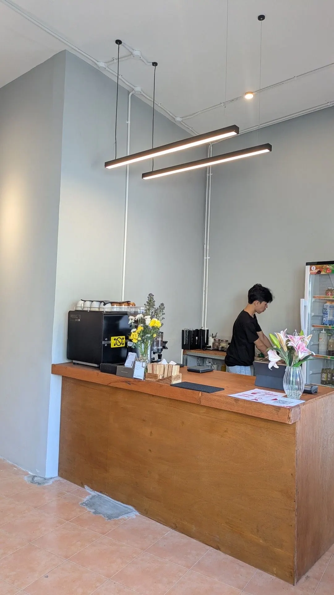 Juandi behind the counter at the Senggigi shop